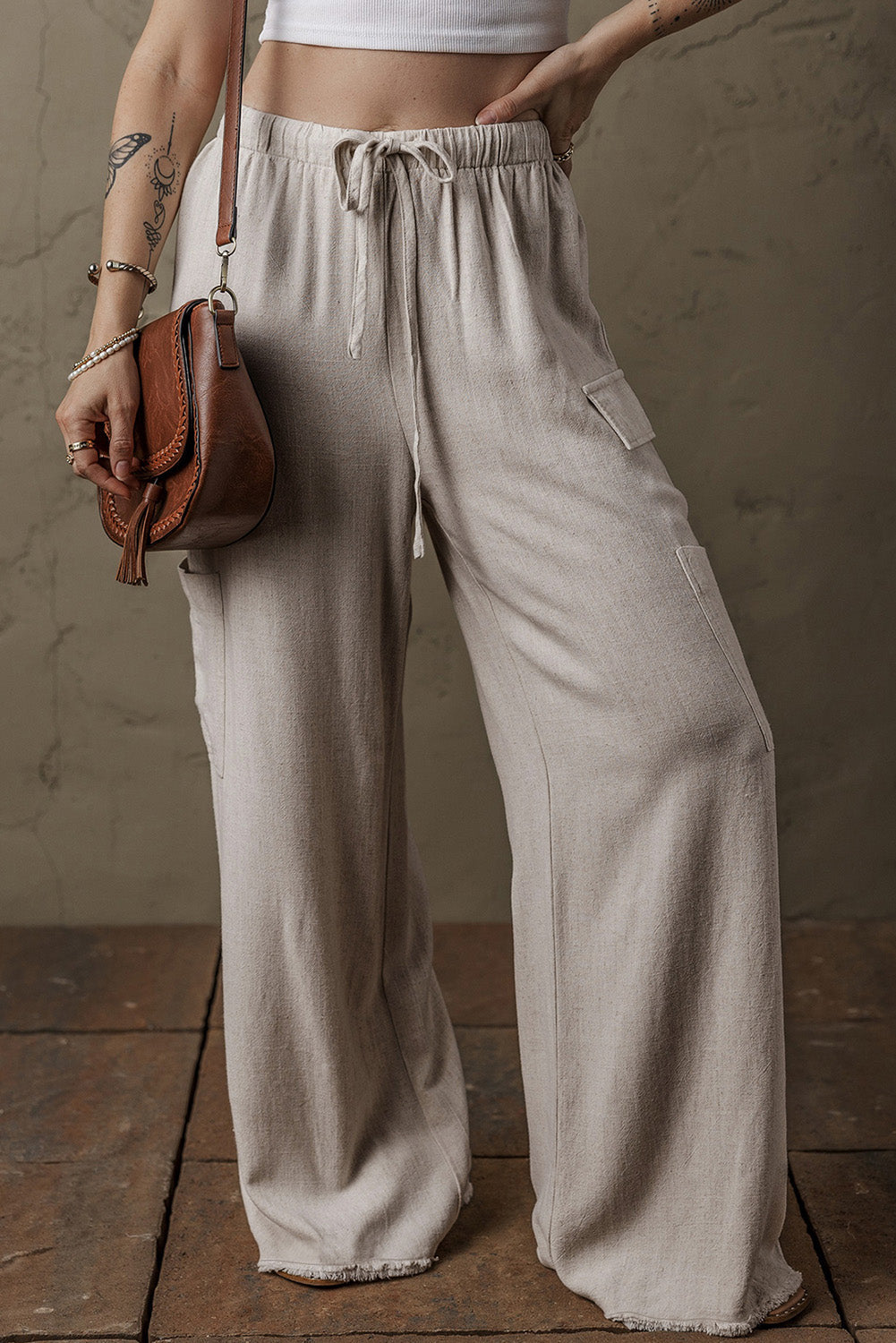 Pantalon ample cargo en lin style bohème avec cordon de serrage a la taille et bords bruts