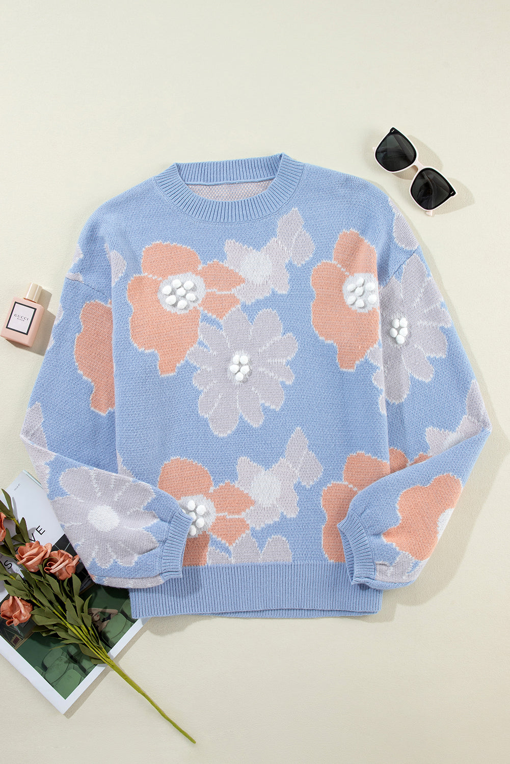 Pull tricoté fleuri a col rond et épaules tombantes