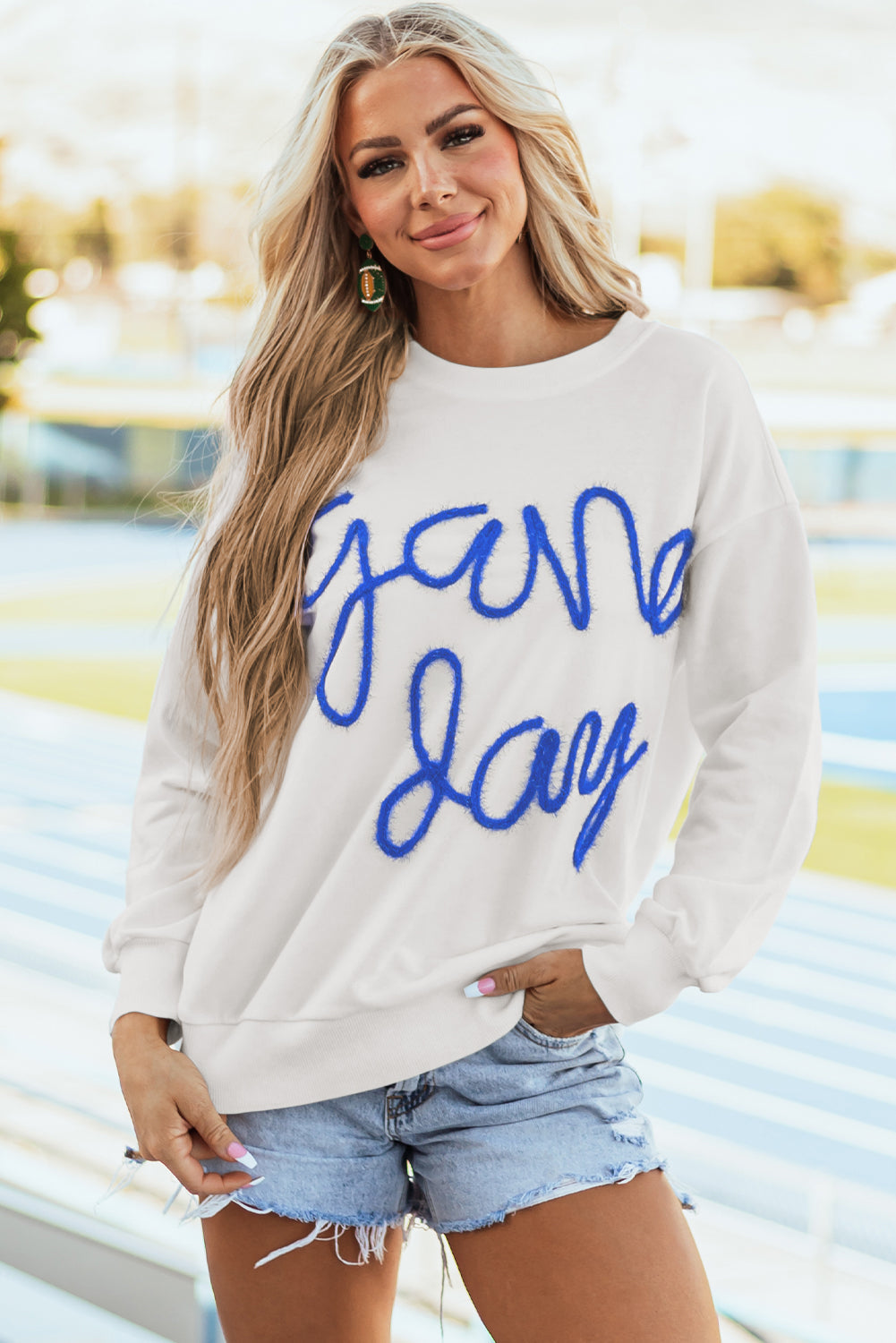 Tinsel Game Day - Sweat-shirt graphique a épaules tombantes
