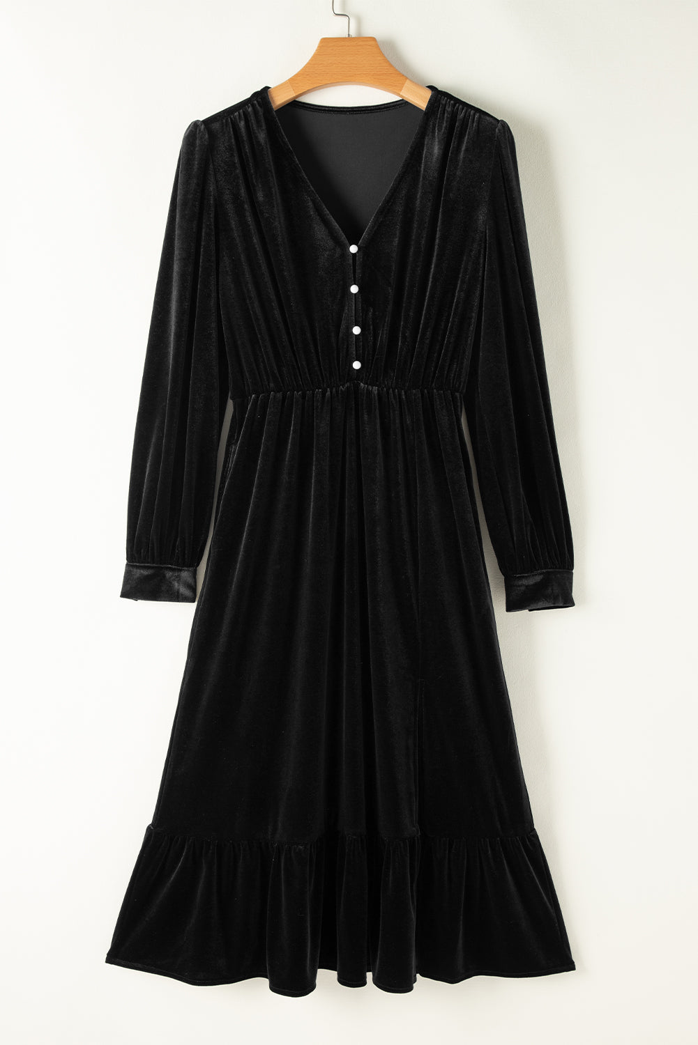 Robe mi-longue fendue en velours boutonnée a manches bouffantes et col en V