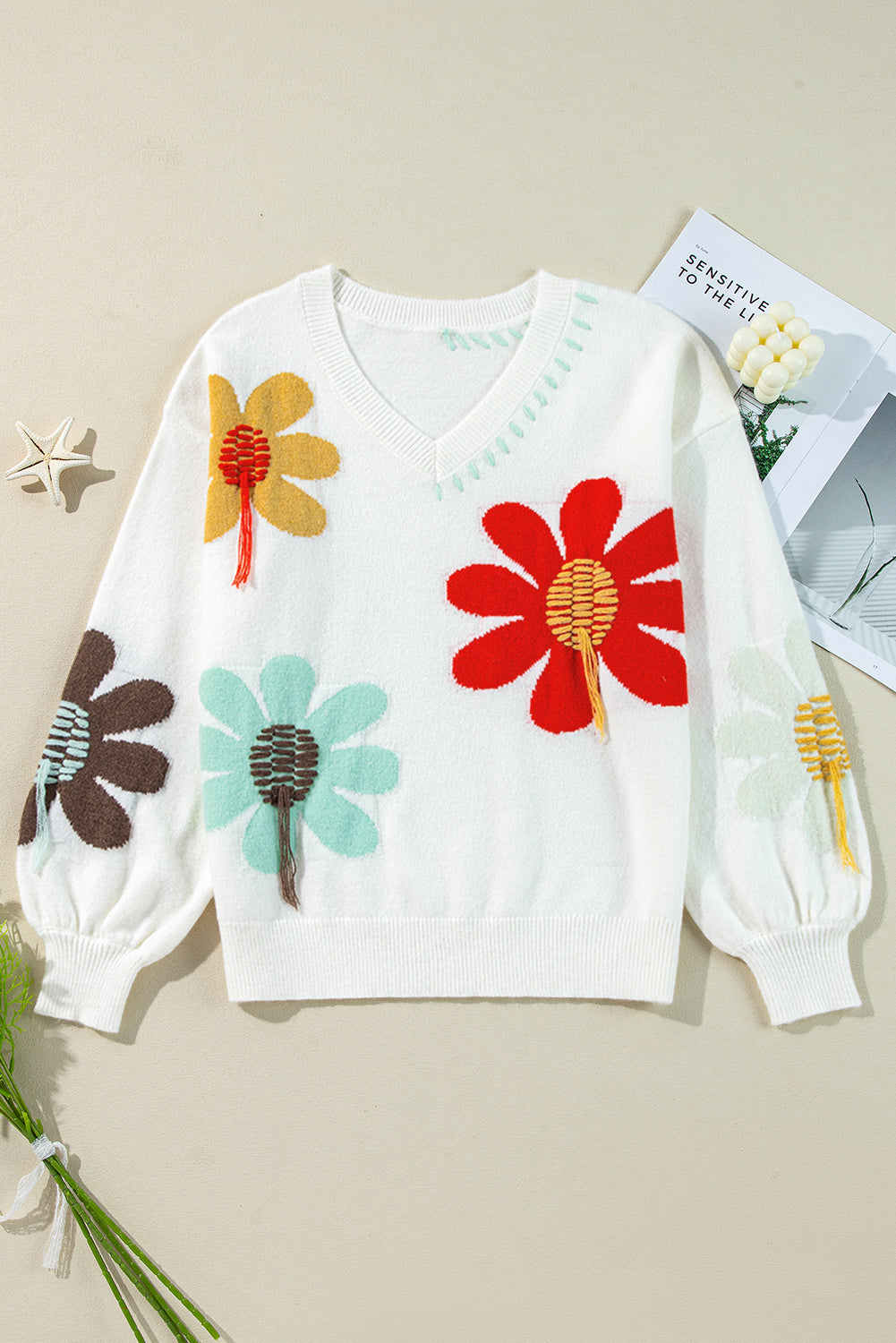 Pull a col en V et épaules tombantes a motif de grandes fleurs
