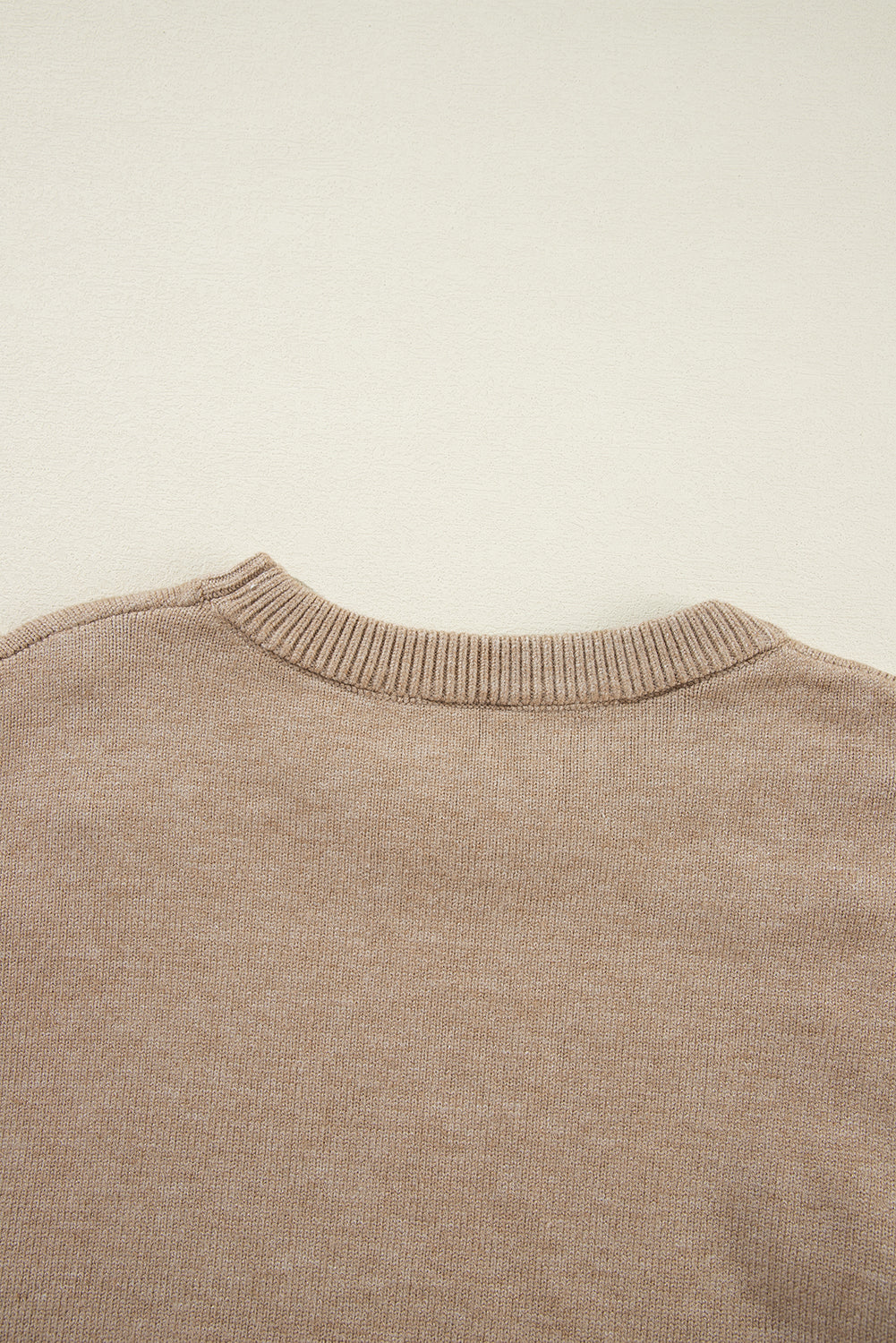 Pull à col rond et épaules tombantes perlées
