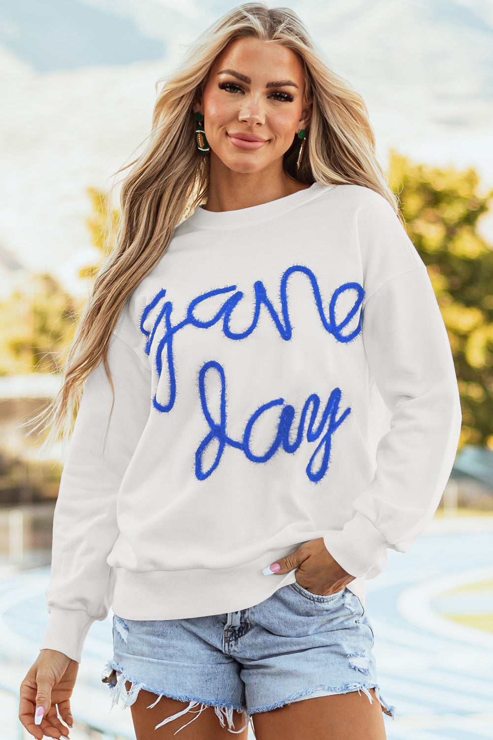 Tinsel Game Day - Sweat-shirt graphique a épaules tombantes