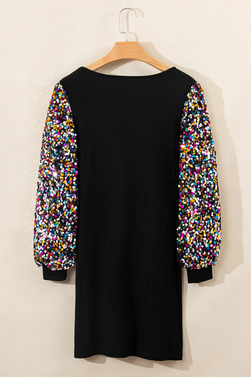 Mini-robe pull a paillettes et manches évêque, col en U