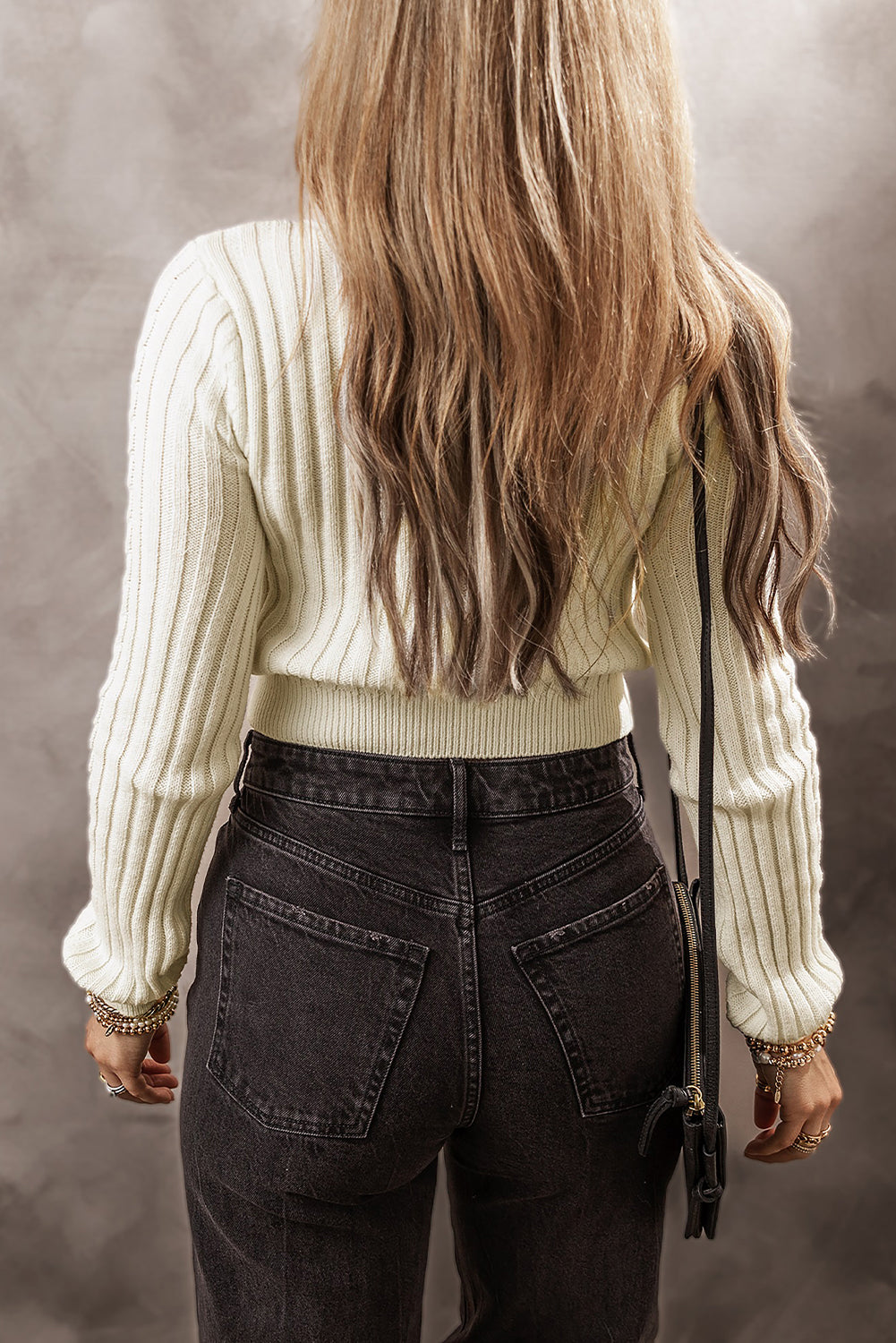 Pull court en tricot torsadé