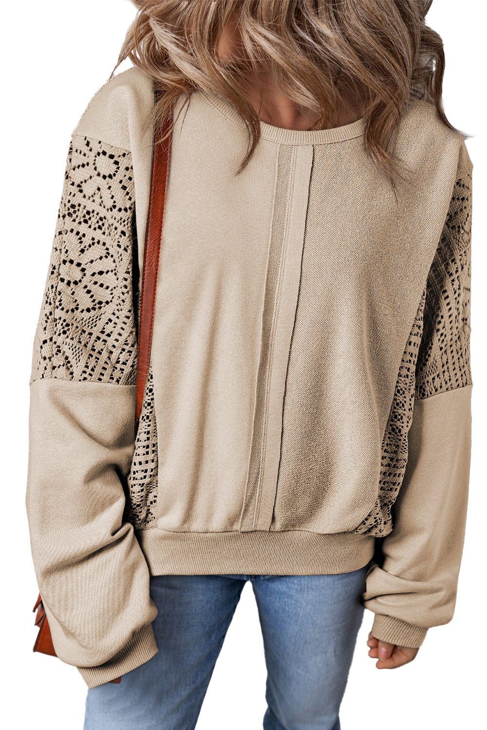 Sweat-shirt en tricot au crochet avec coutures apparentes et bordure côtelée