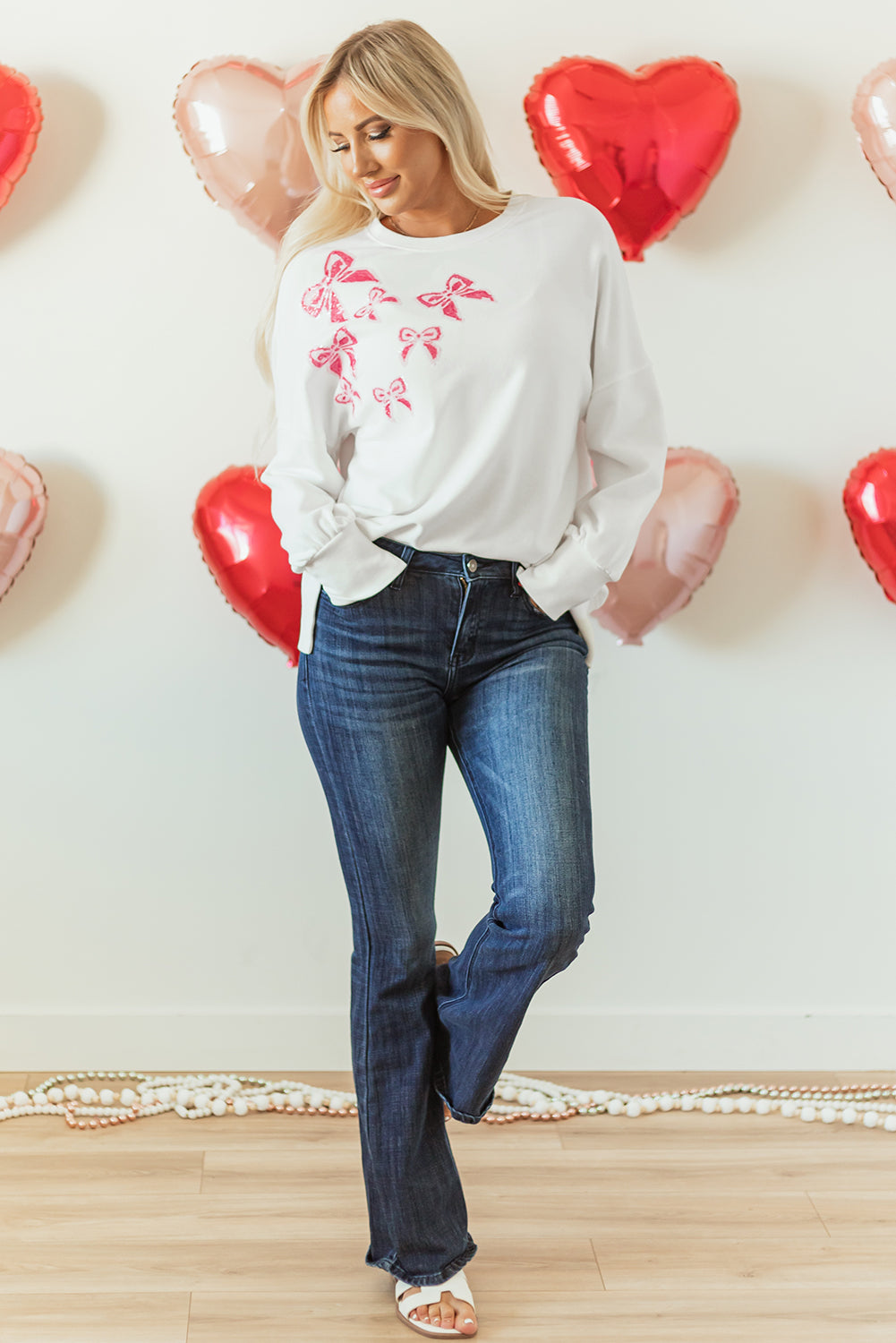 Sweat-shirt surdimensionné a paillettes et nœud papillon