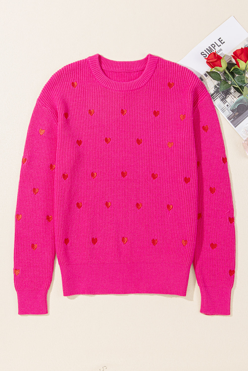 Pull a col rond et épaules tombantes en forme de cœur
