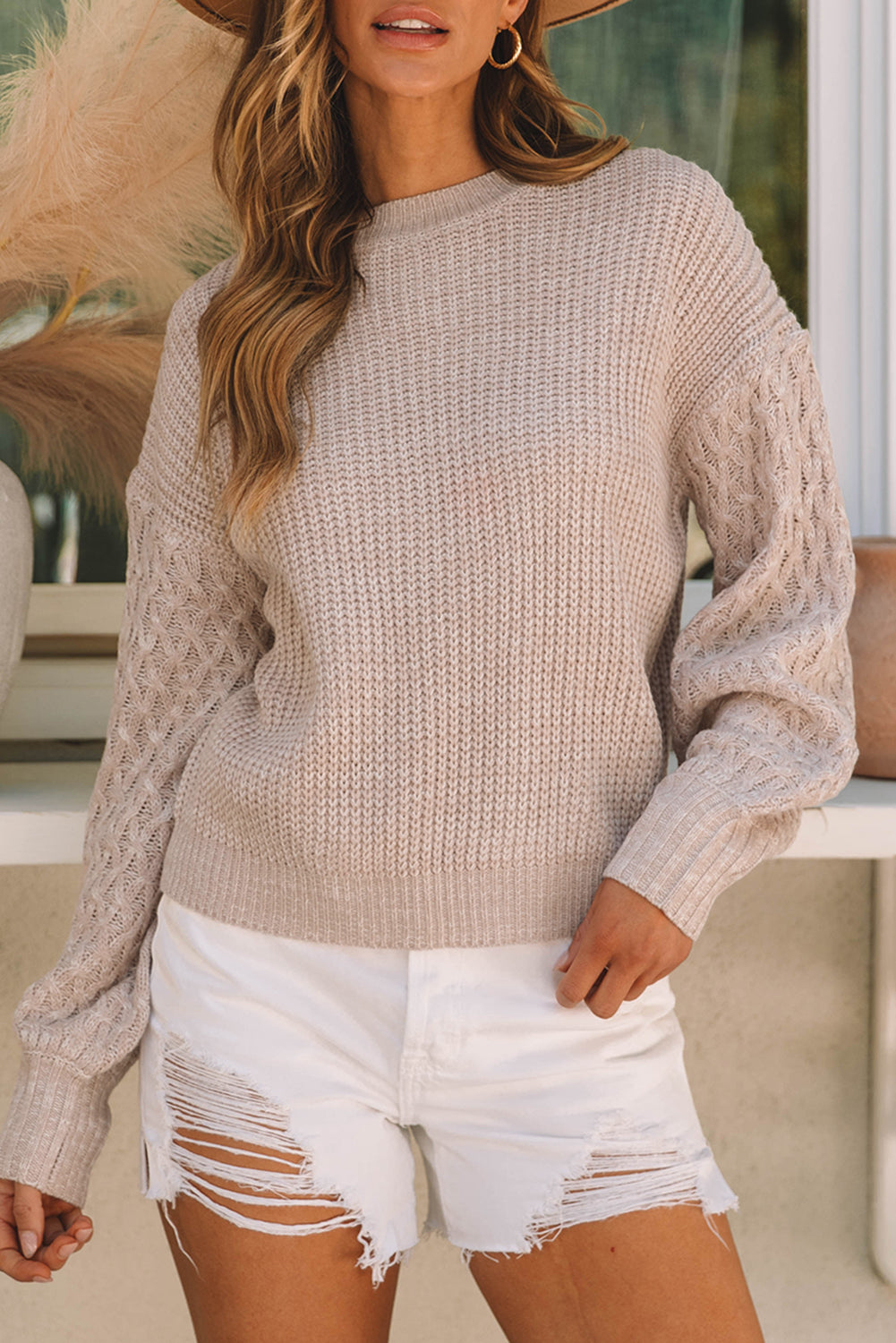 Pull à épaules tombantes et manches en tricot torsadé