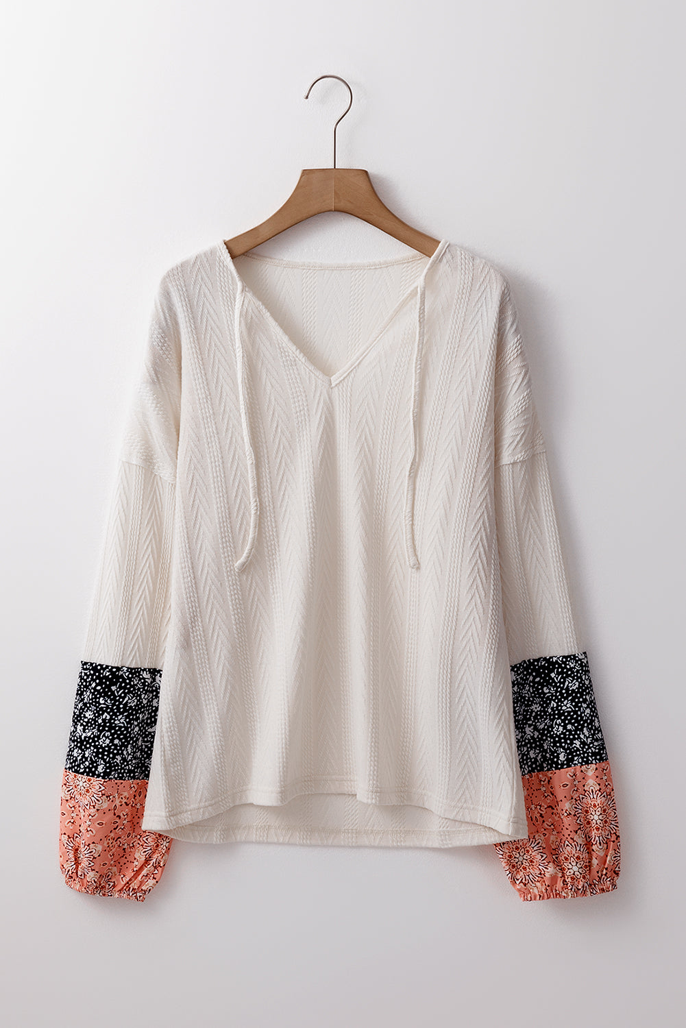 Chemisier à col en V avec cordon de serrage en tricot texturé patchwork floral