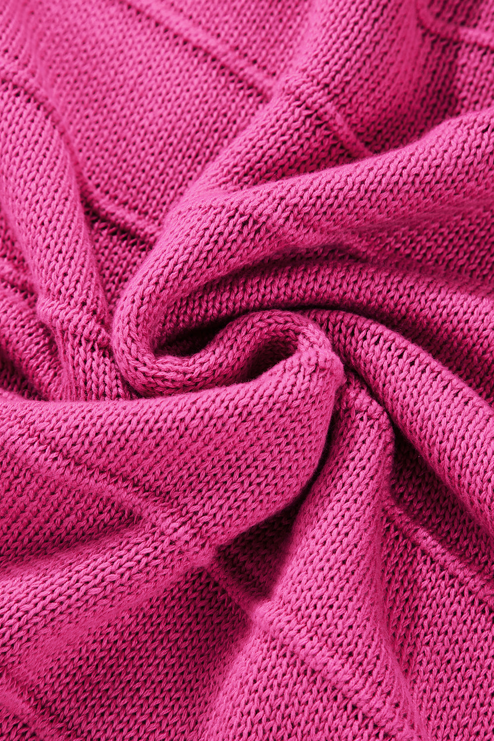 Pull ample a col rond et découpe avec nœud papillon