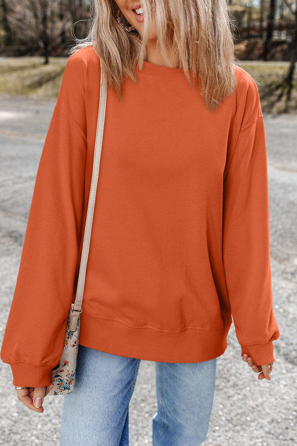 Sweat-shirt uni a col rond et épaules tombantes