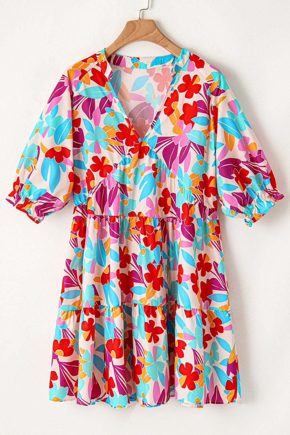 Robe grande taille fleurie à volants et col en V