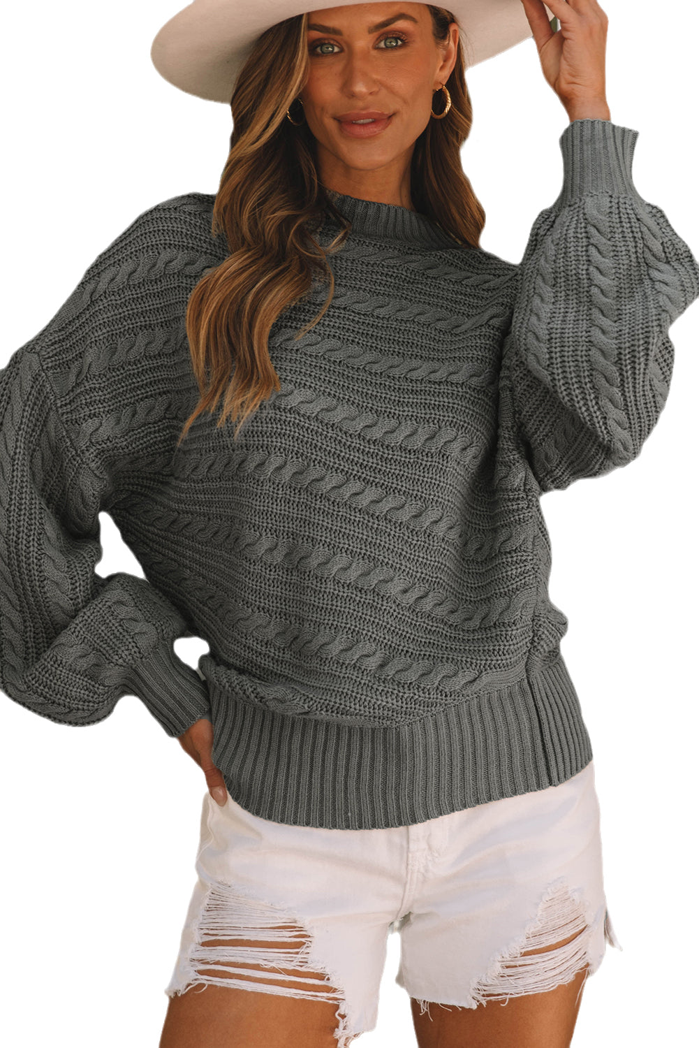 Pull en tricot torsadé à manches lanternes et col montant