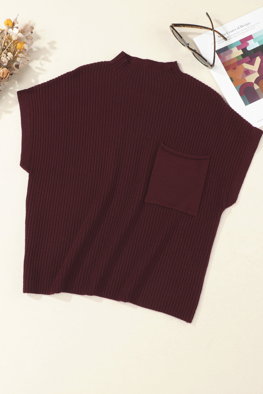 Pull a manches courtes en tricot côtelé avec poche plaquée