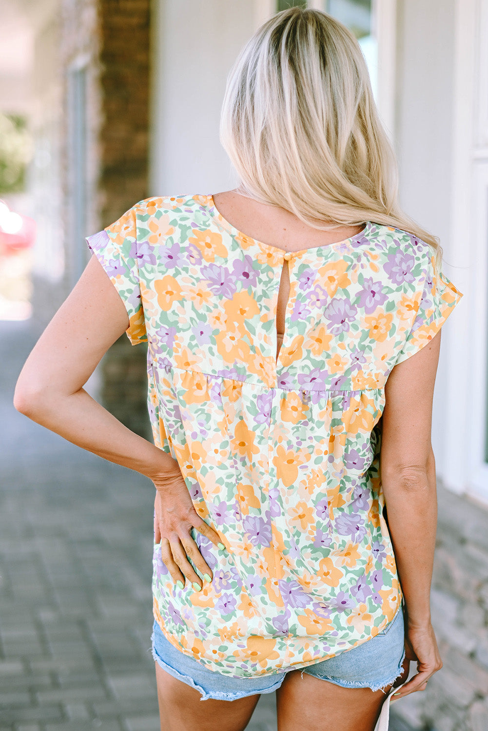 Chemisier babydoll à manches courtes et imprimé floral au dos