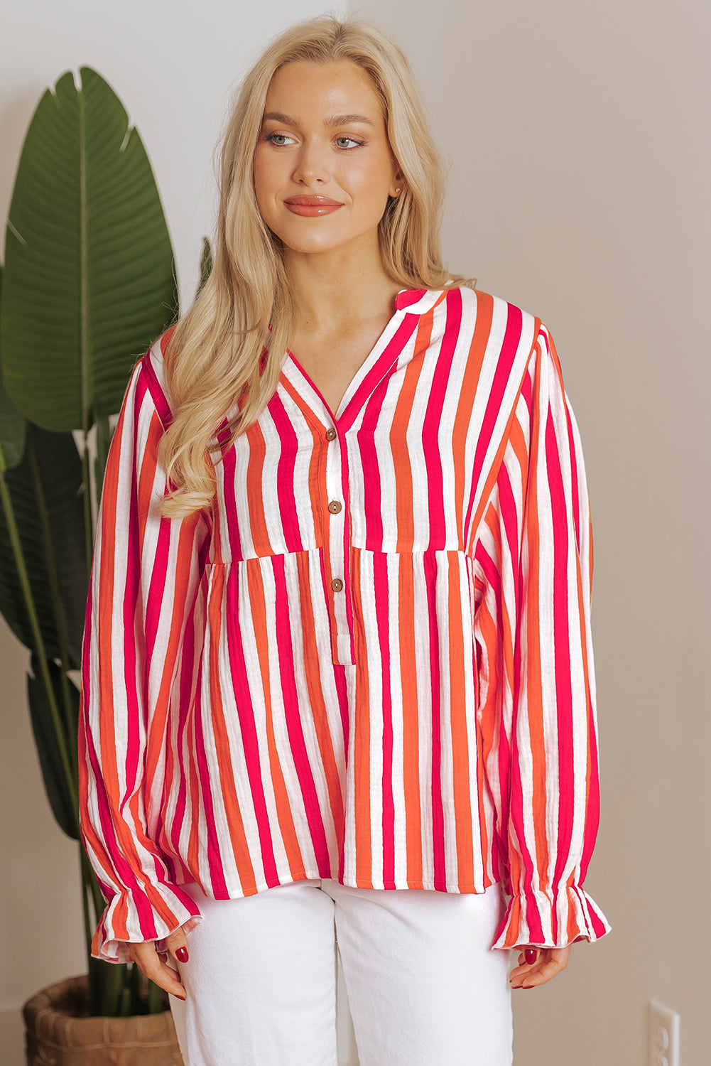 Blouse boutonnée sur le devant a col en V cranté et manches ballon