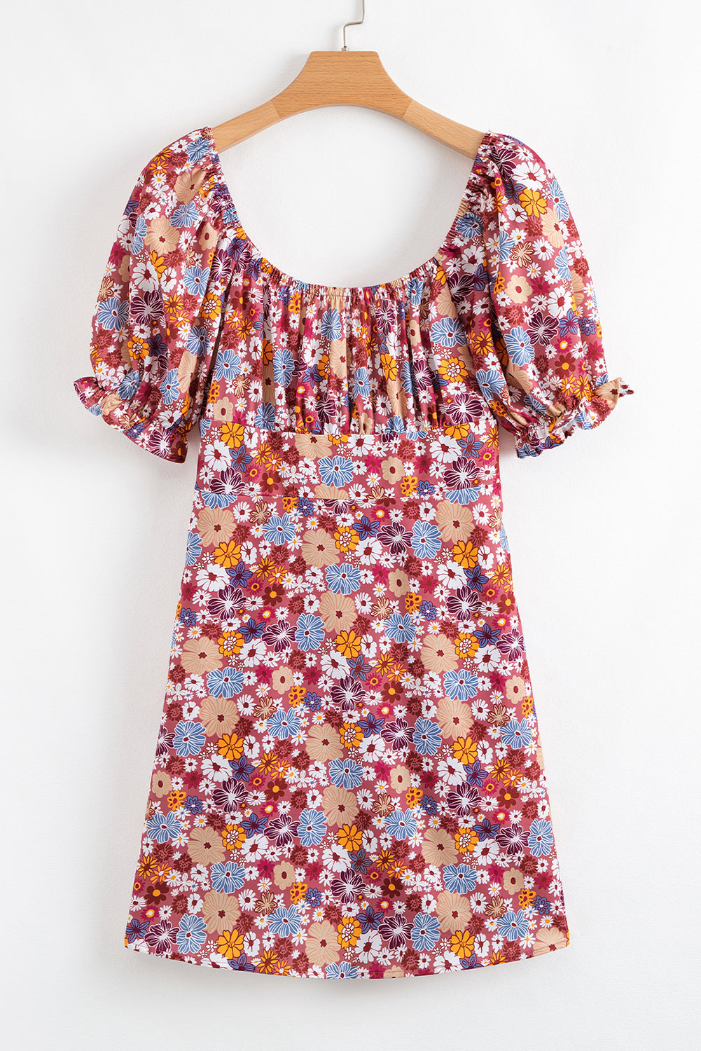 Mini-robe fleurie à manches bouffantes, col carré, nœud et dos ouvert