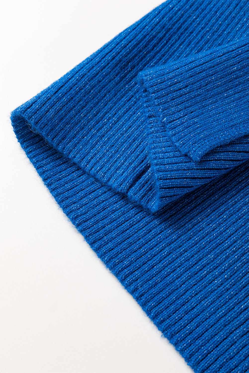 Robe pull mi-longue sans manches en tricot côtelé uni