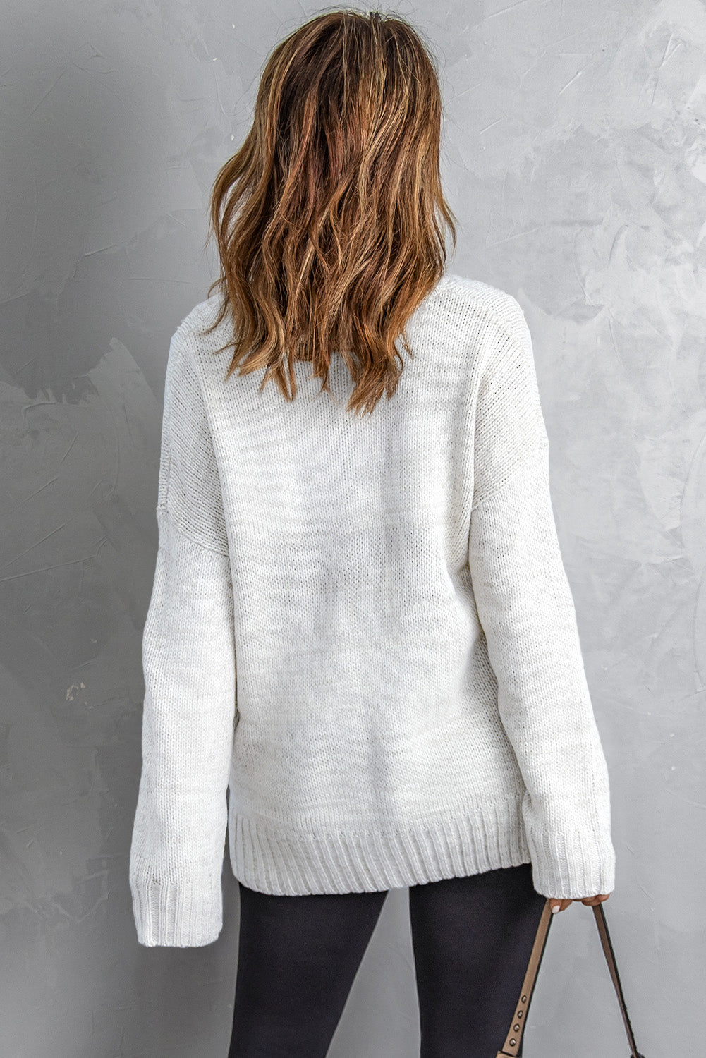 Pull tricoté à épaules tombantes et col en V