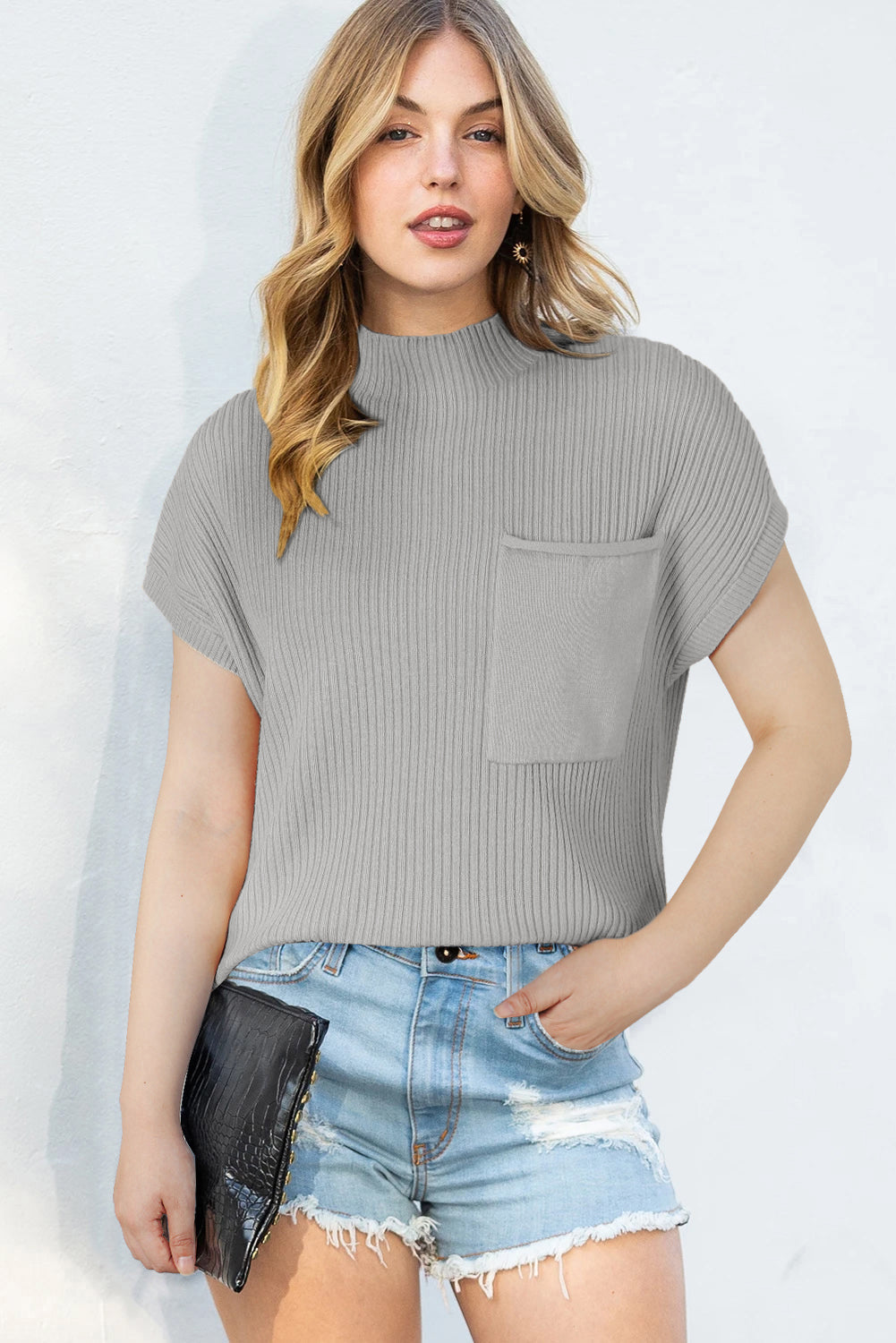 Pull a manches courtes en tricot côtelé avec poche plaquée