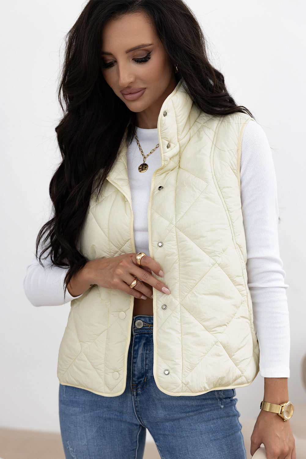 Manteau gilet matelassé a col haut et boutonné avec poche