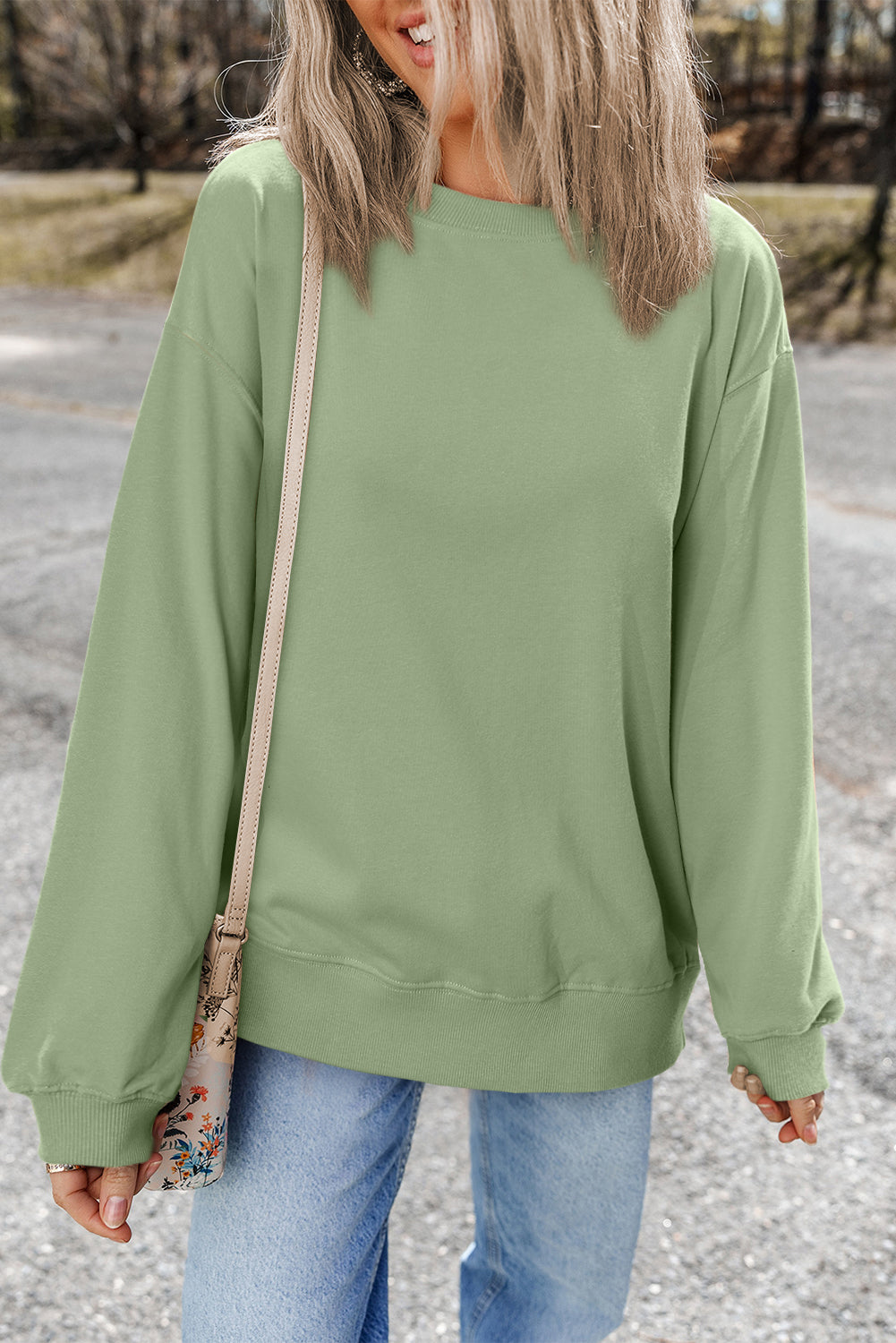 Sweat-shirt uni a col rond et épaules tombantes