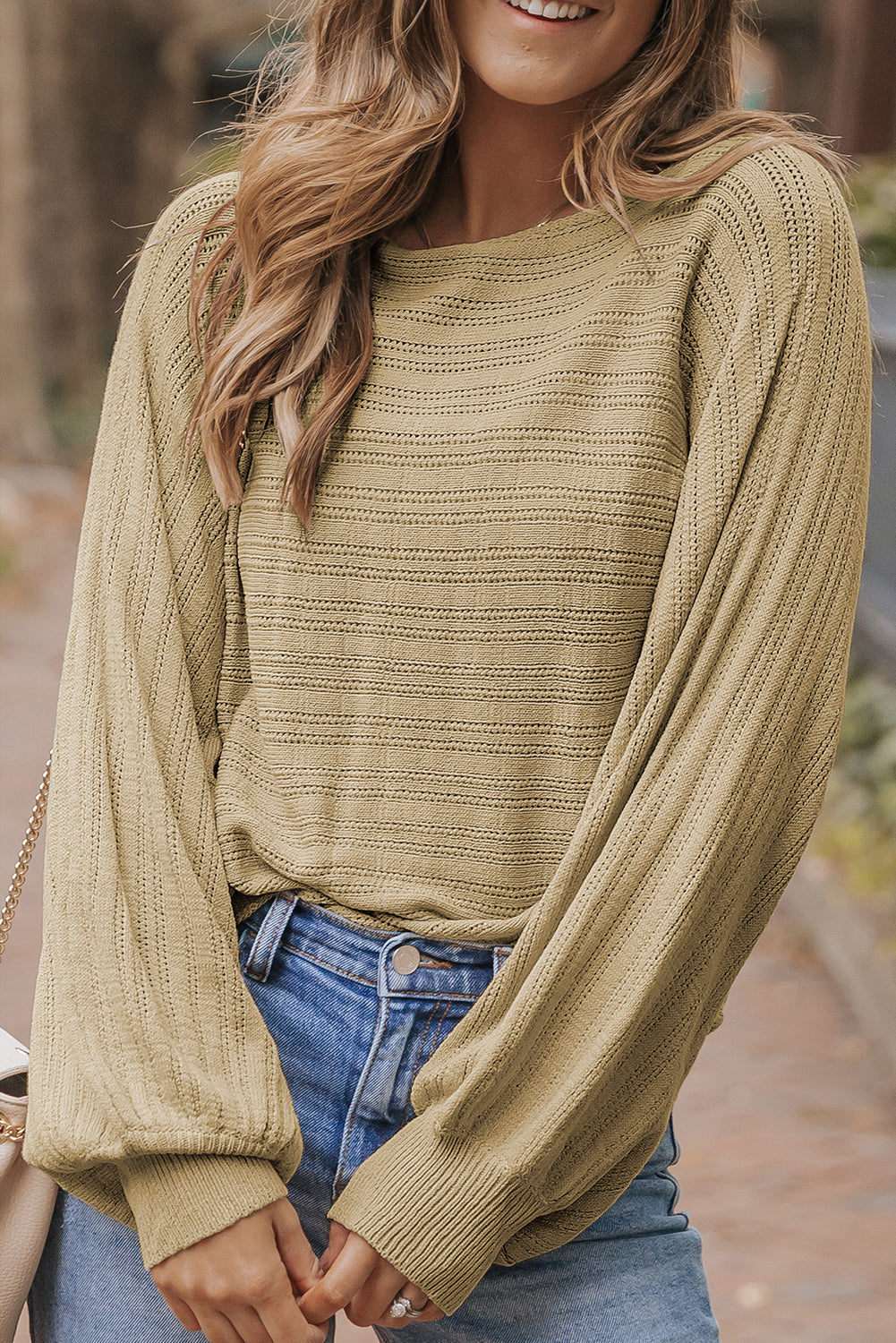Pull en tricot texturé à œillets et manches lanternes