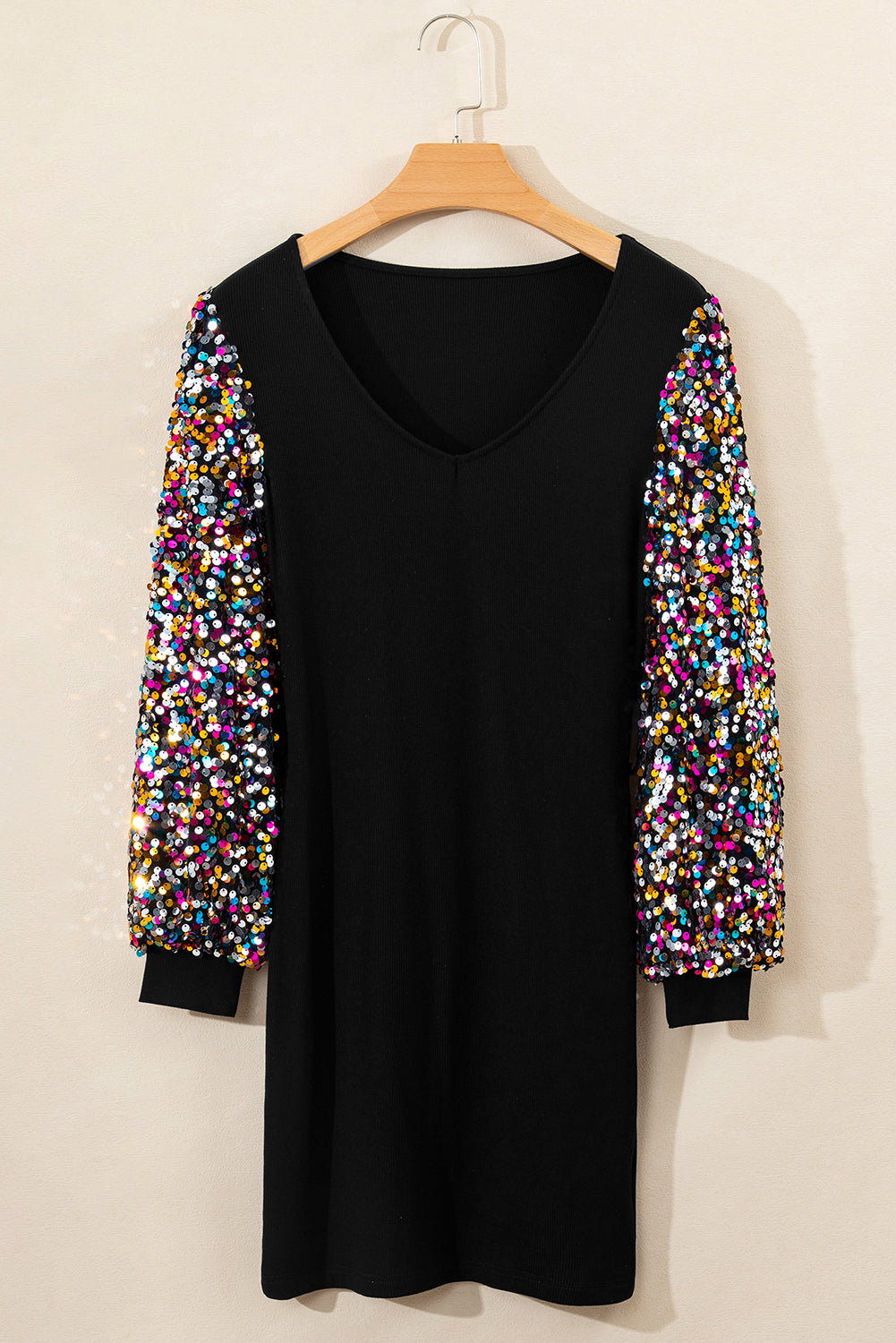 Mini-robe pull a paillettes et manches évêque, col en U