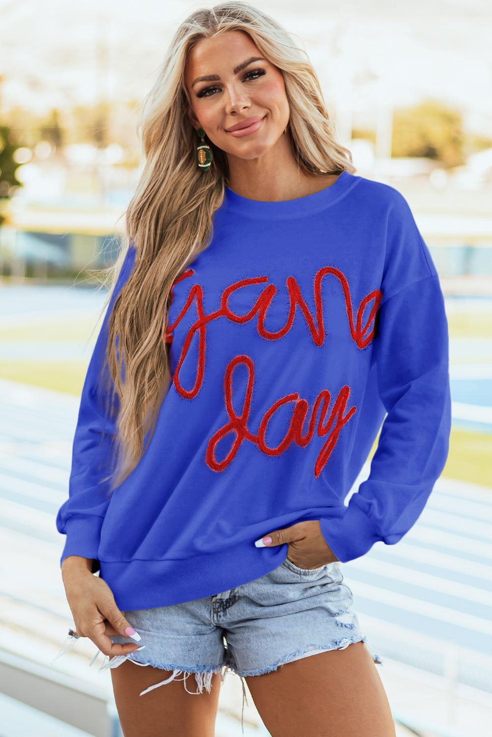 Tinsel Game Day - Sweat-shirt graphique a épaules tombantes