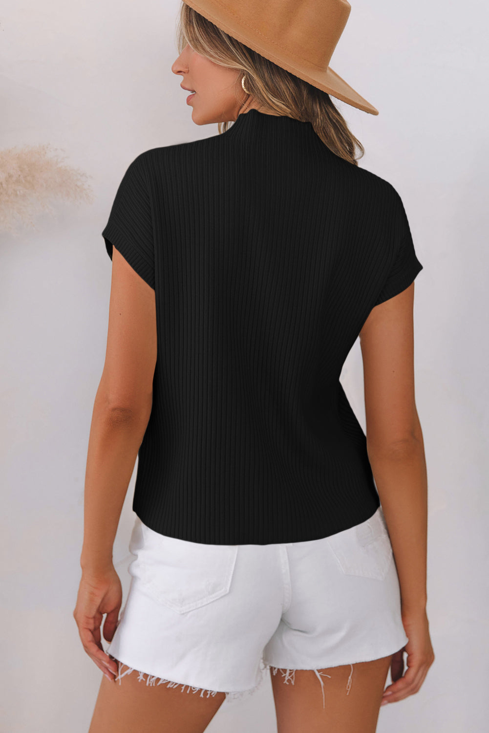 Pull a manches courtes en tricot côtelé avec poche plaquée