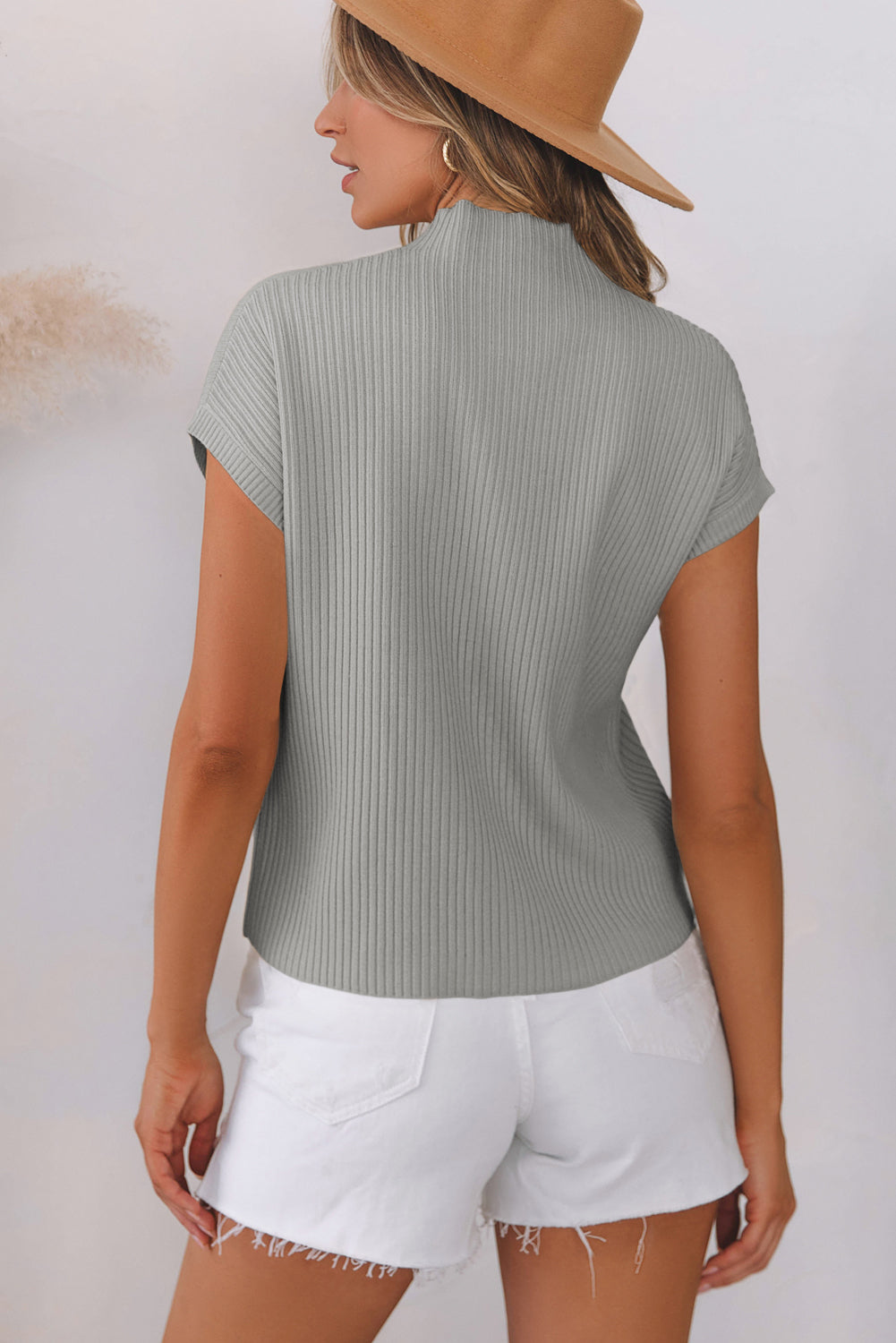 Pull a manches courtes en tricot côtelé avec poche plaquée