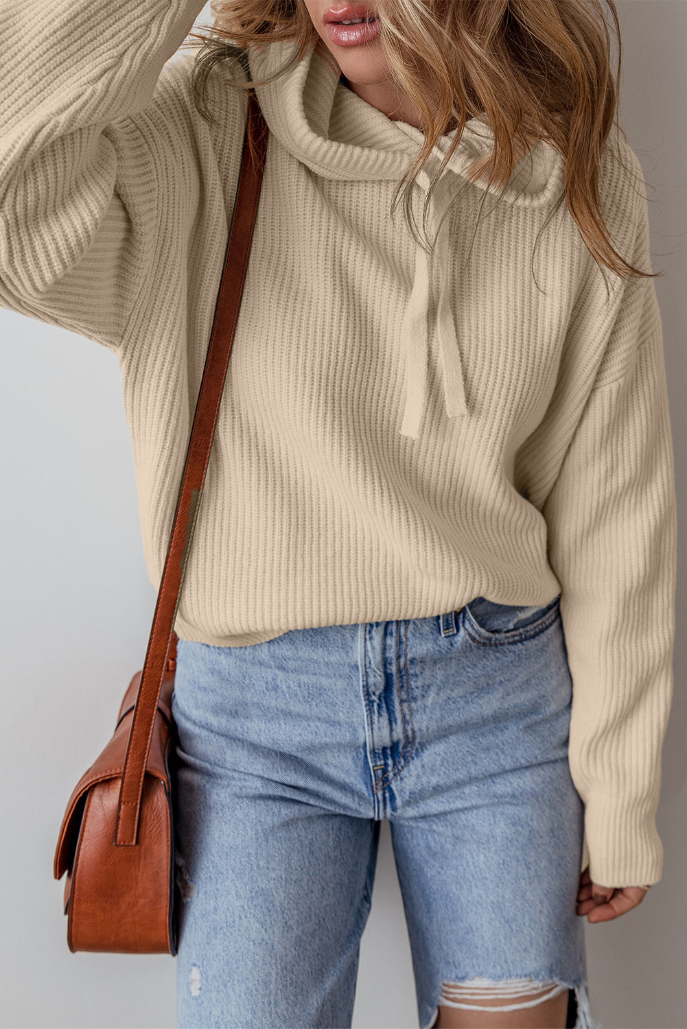 Pull a capuche avec cordon de serrage et épaules tombantes de couleur unie