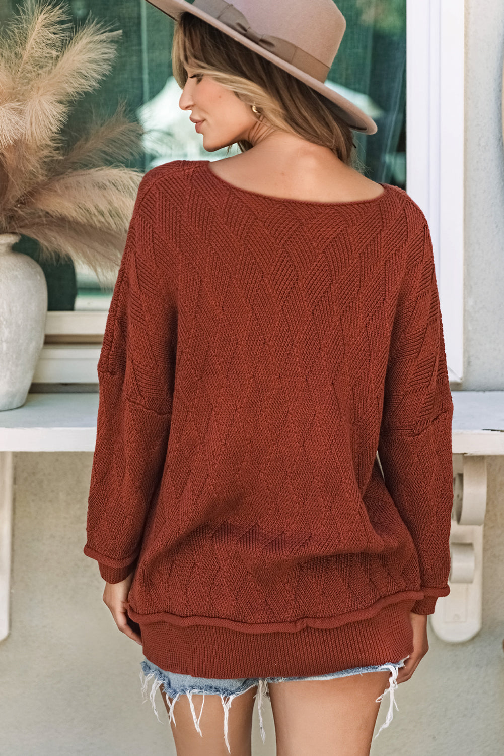 Pull ample texturé à col rond de couleur unie