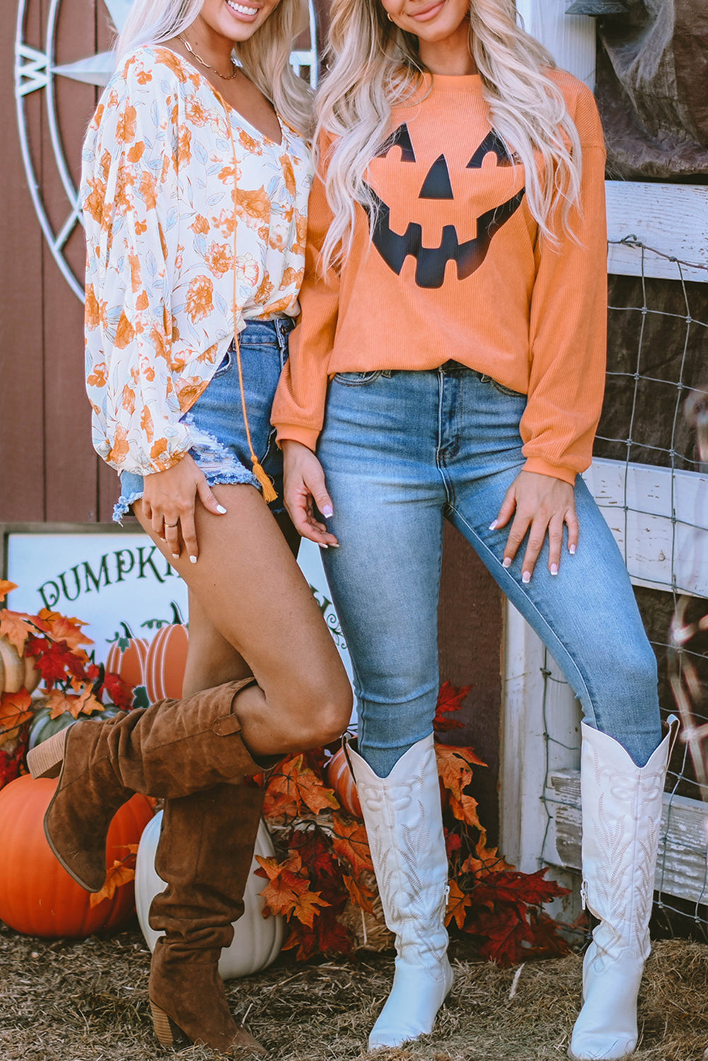 Sweat-shirt graphique orange avec visage souriant et citrouille