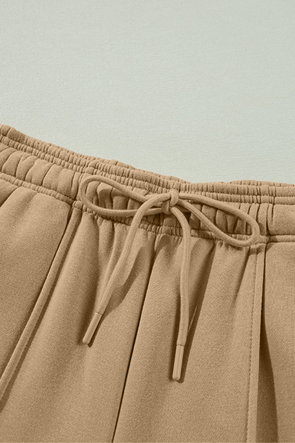 Pantalon large taille haute avec cordon de serrage et coutures apparentes