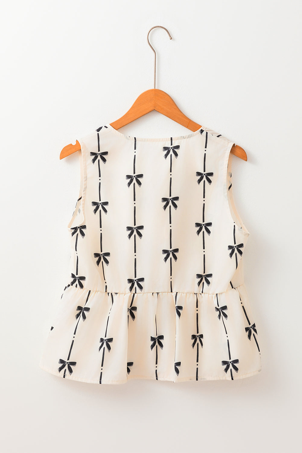 Gilet à volants avec fermeture à nouer et imprimé nœud