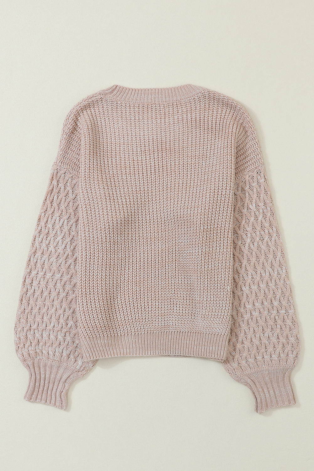 Pull à épaules tombantes et manches en tricot torsadé