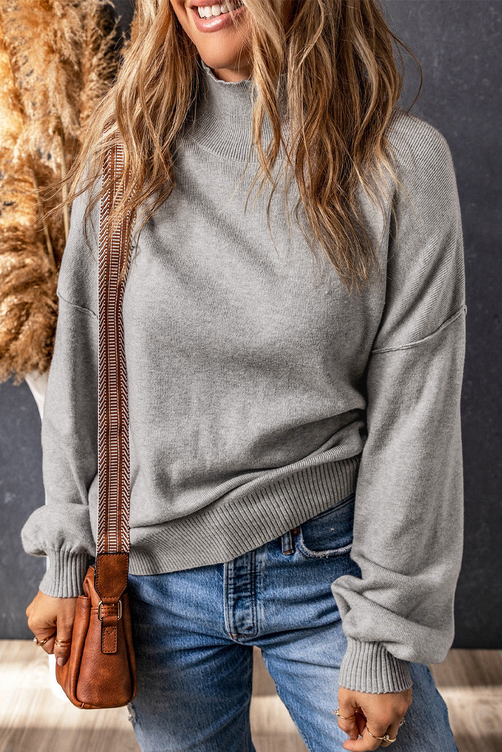 Pull en tricot à col roulé, épaules tombantes et manches bulles