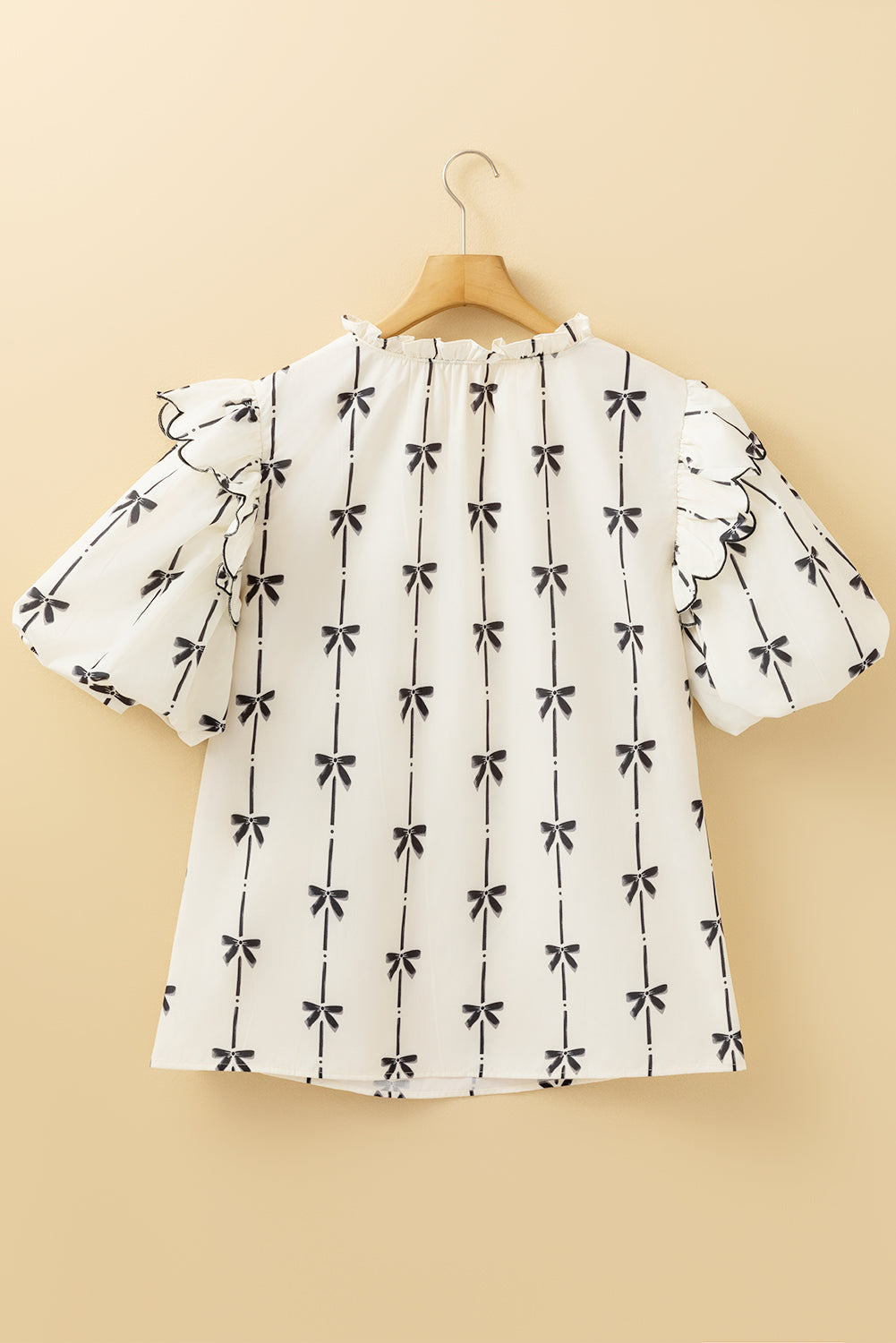 Chemisier grande taille à volants, manches bouffantes, lacets, col cranté et imprimé nœud