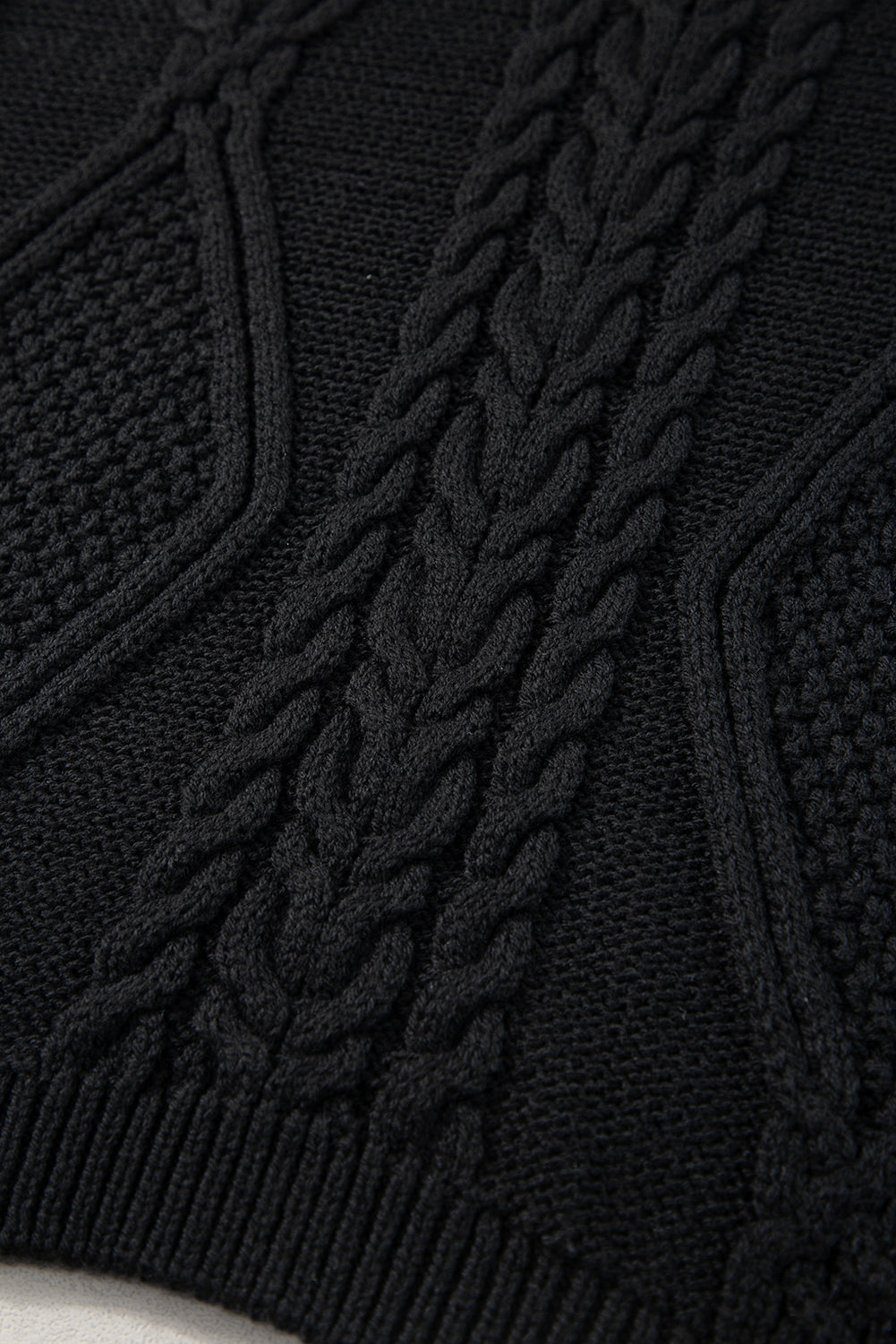 Gilet pull a col haut en tricot torsadé de couleur unie