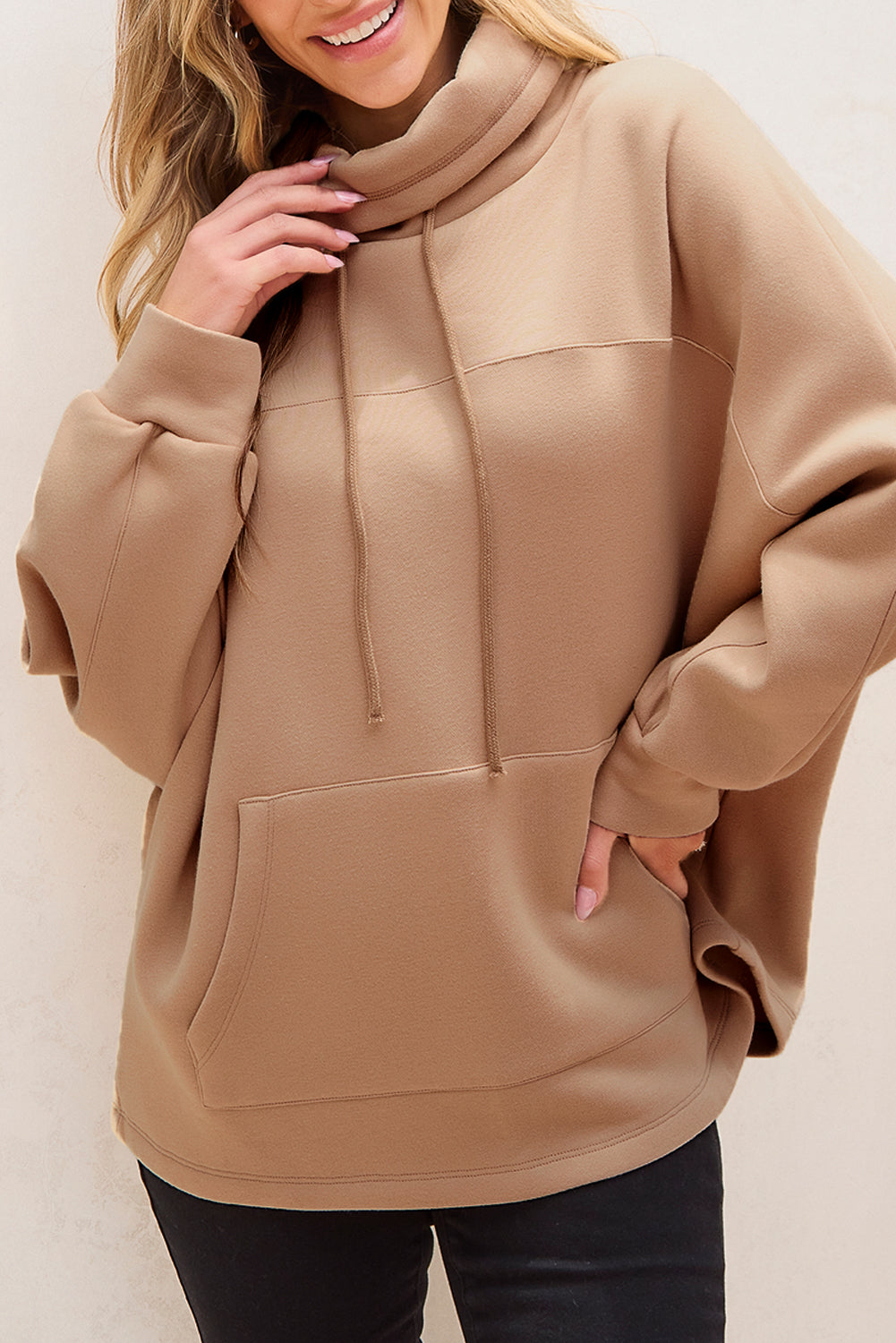 Sweat-shirt a col roulé et manches chauve-souris avec cordon de serrage