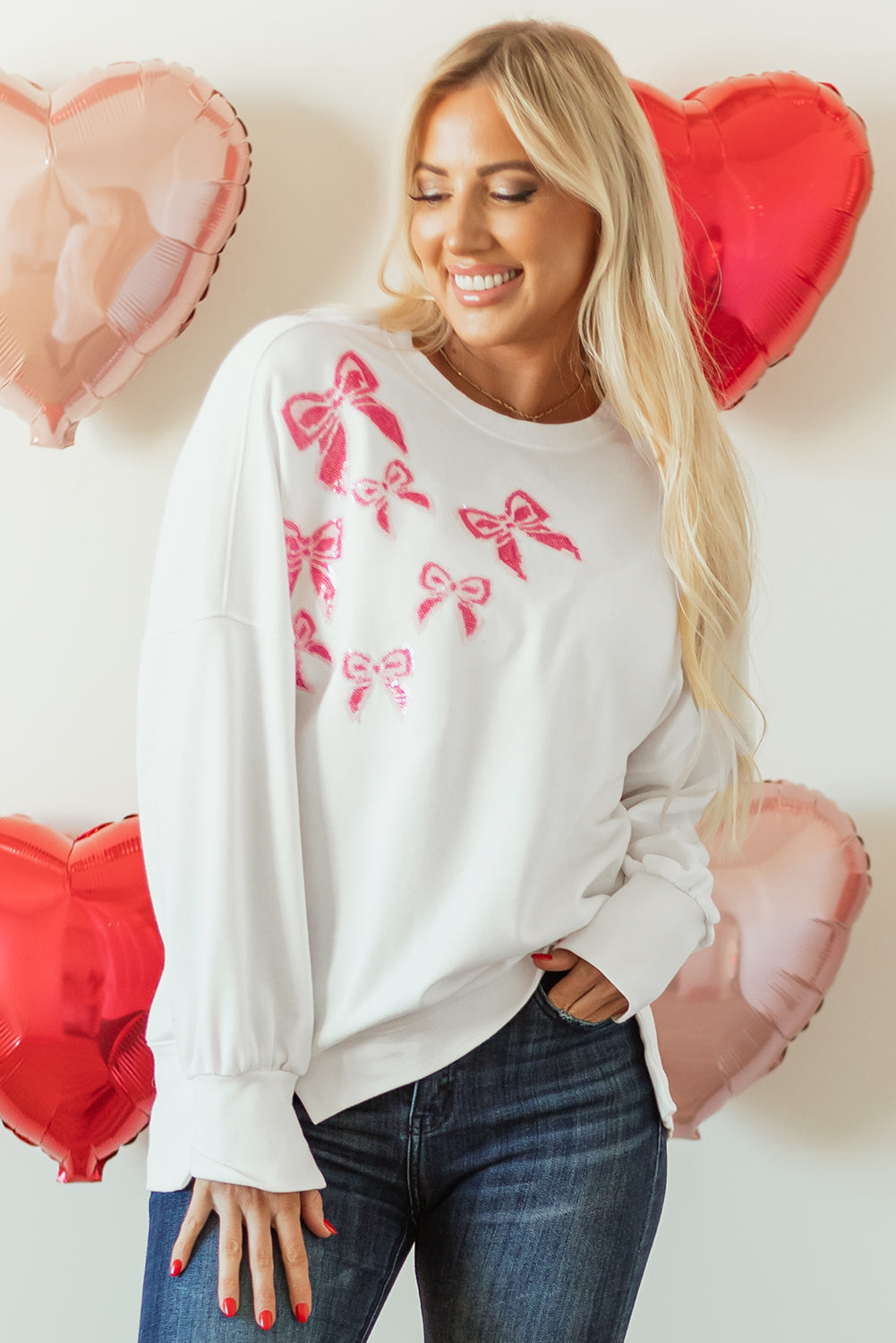 Sweat-shirt surdimensionné a paillettes et nœud papillon