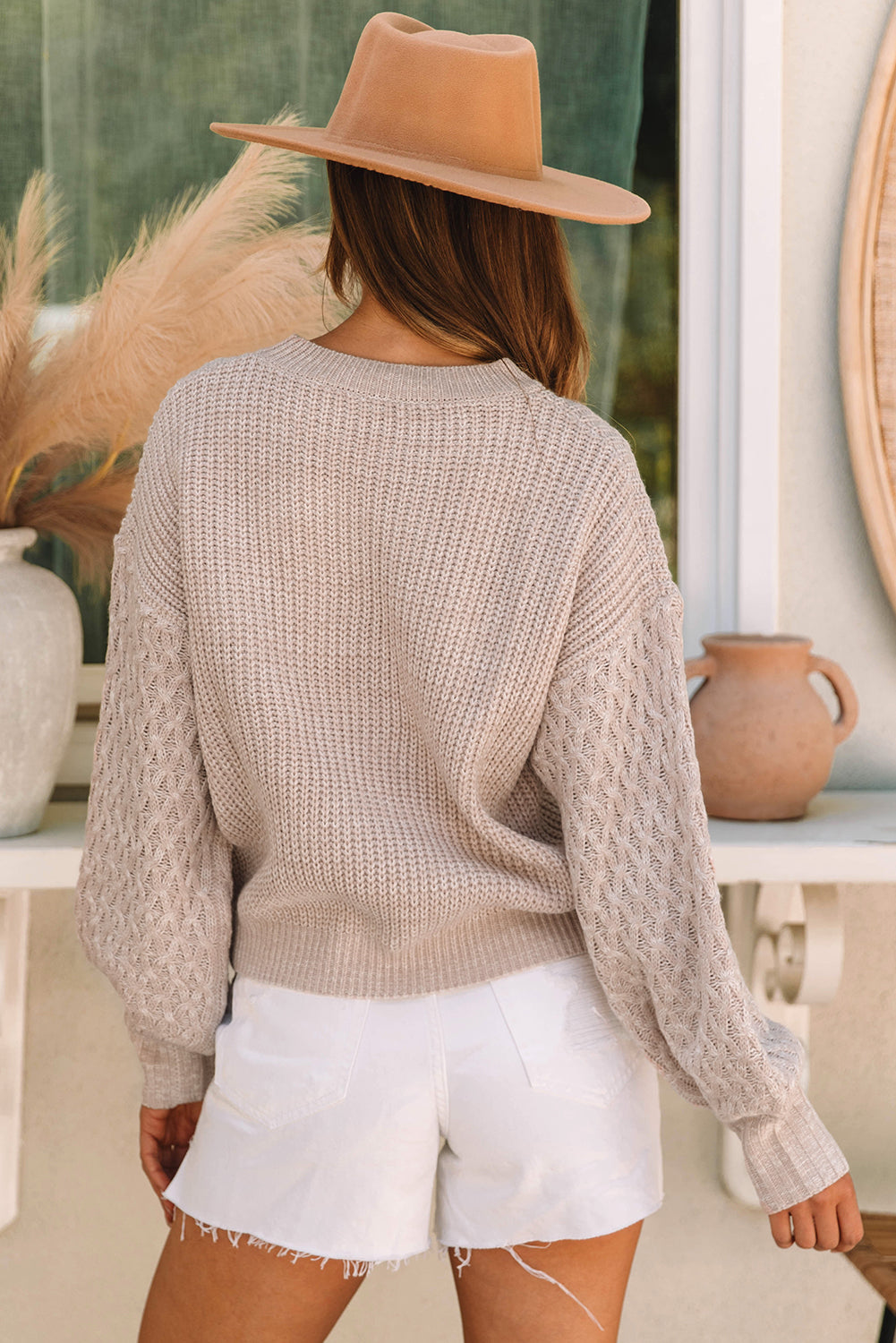 Pull à épaules tombantes et manches en tricot torsadé