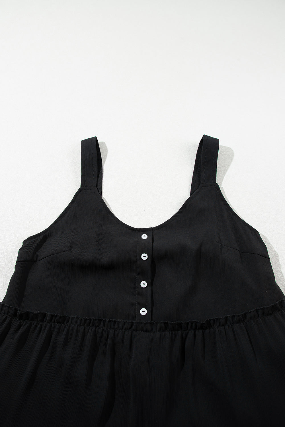 Robe sans manches à volants et col en V boutonné