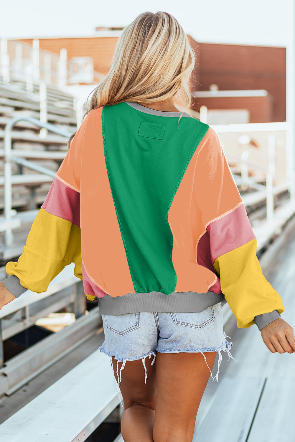 Haut oversize a coutures apparentes et patchwork de couleurs