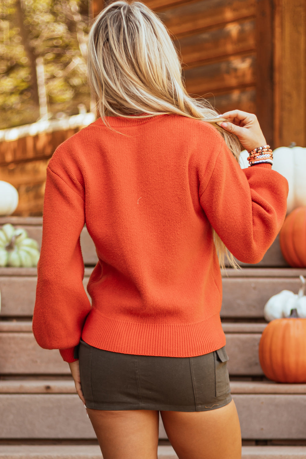 Pull a épaules tombantes a motif de visage de citrouille d'Halloween