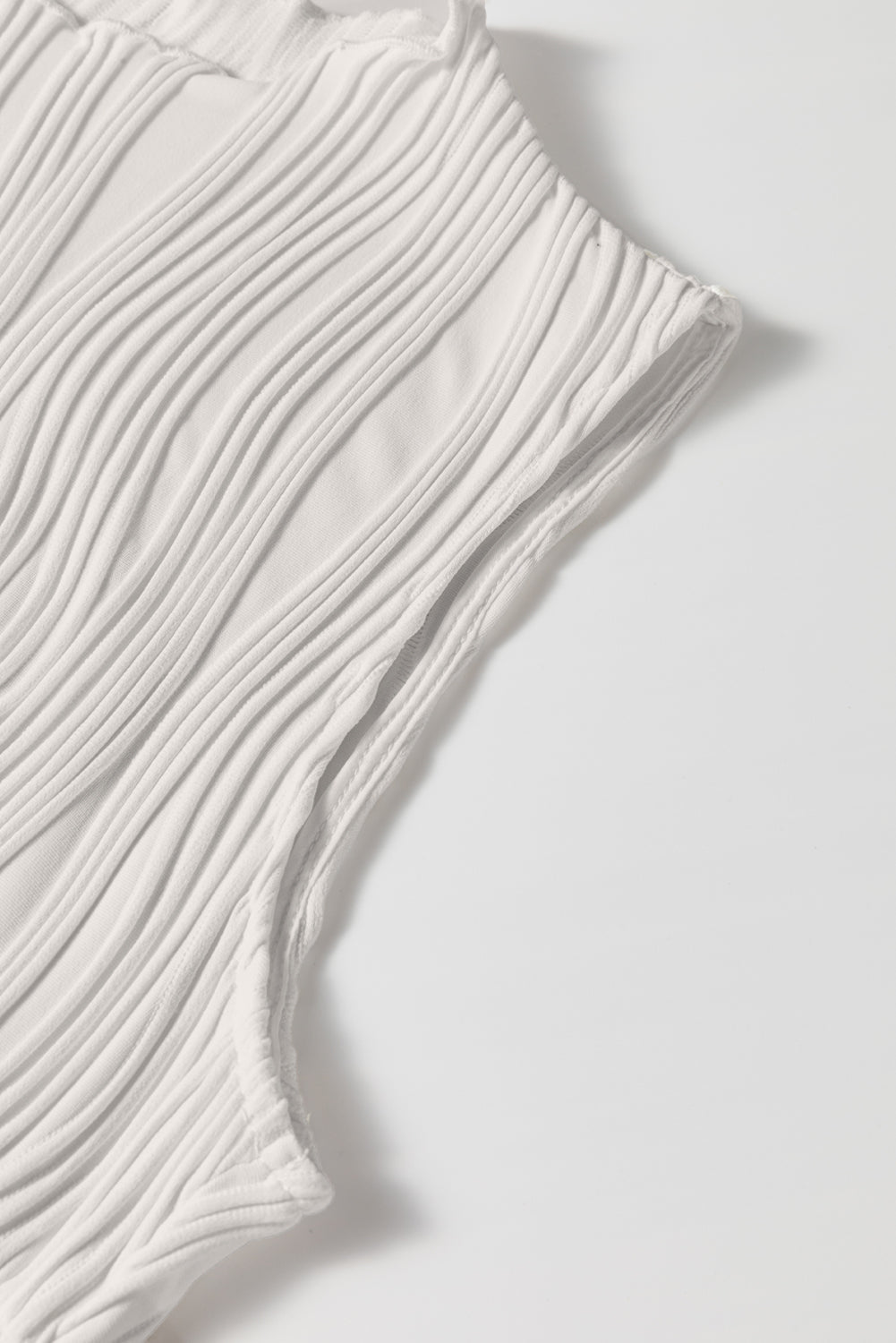 Débardeur à col rond texturé ondulé de couleur unie