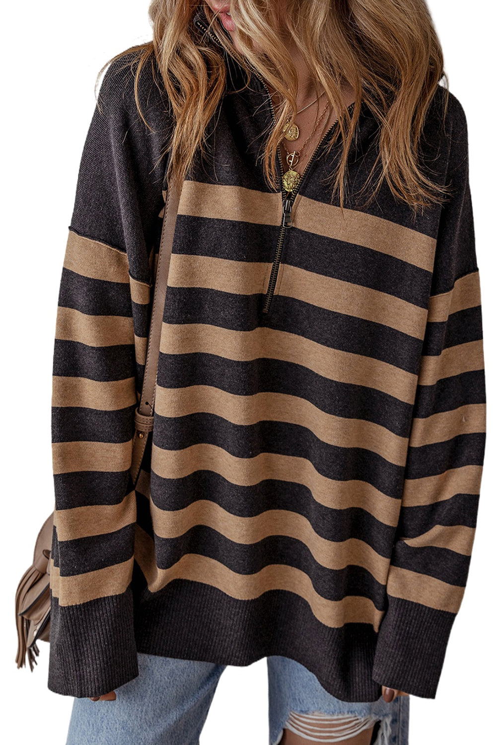 Pull surdimensionné à col et fermeture éclair sur un quart