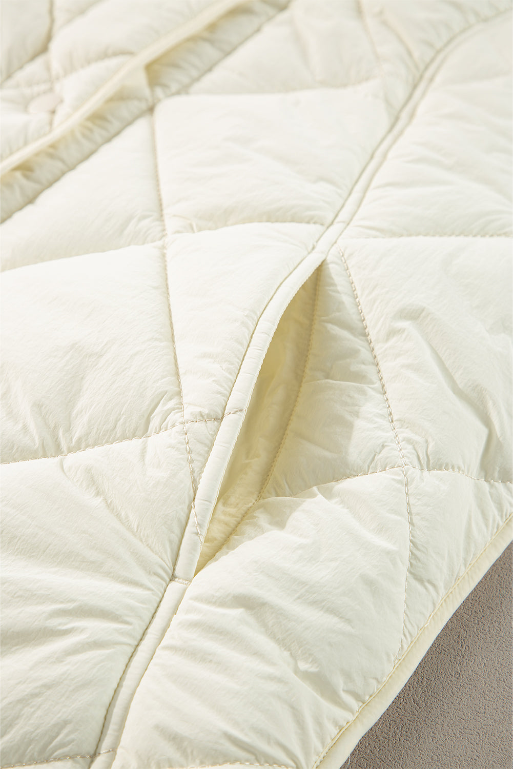 Manteau gilet matelassé a col haut et boutonné avec poche